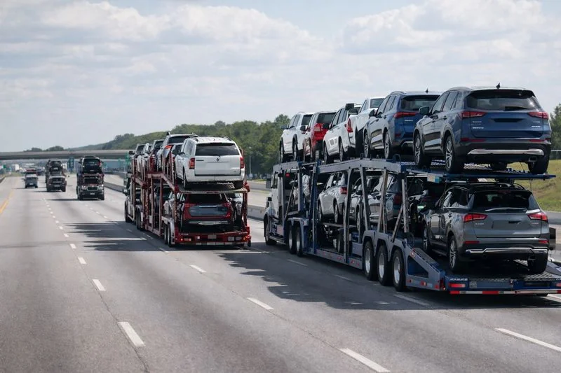 Photo of multiple car transport trucks representing a freight broker’s strong and flexible carrier network.